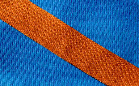 Blue canvas fabric texture with border line of golden brown canvas, textureの写真素材