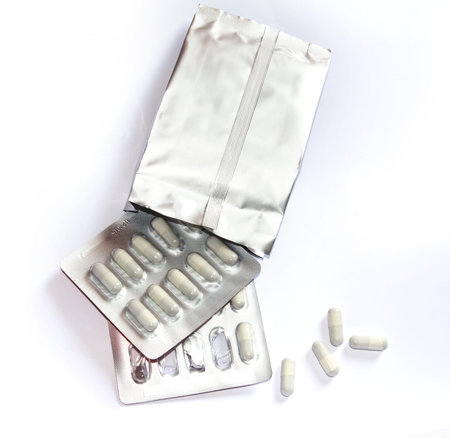 White capsules medicine with package の写真素材