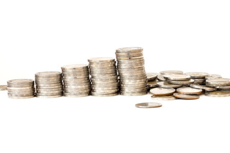 Silver coin , money increasing concept on white 