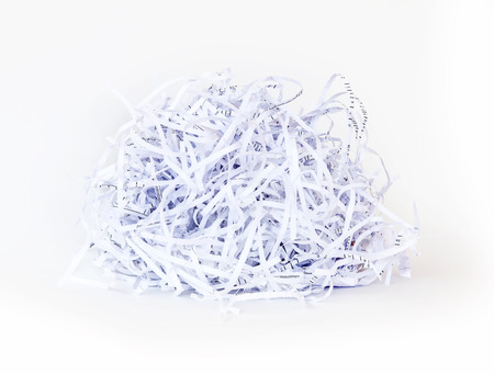 Shredded paper ball on white backgroundの写真素材