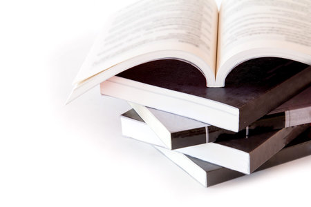 stack of books on white background