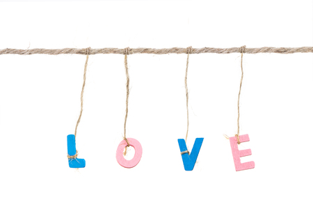 wooden english alphabet love word binded by ropeの写真素材