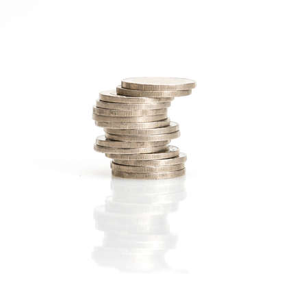 closeup the silver coins stackingの写真素材