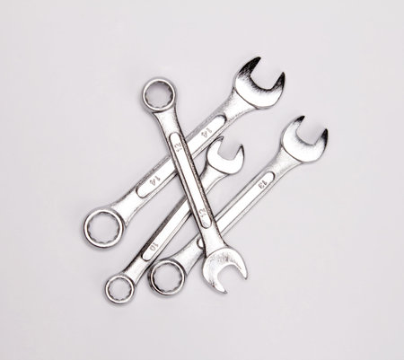 the stainless steel wrench on white background