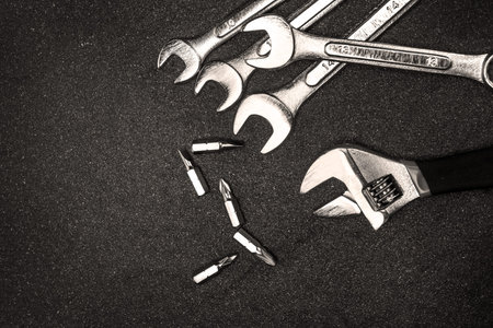set of the stainless steel wrench on white background with space for text