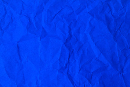 crumpled blue paper textureの写真素材