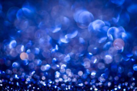 the  Abstract  blur blue  bokeh lighting from glitter textureの写真素材