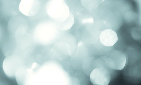 Abstract bokeh lighting background , silver color tone