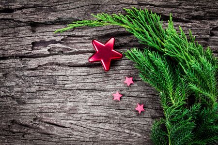 The Christmas ornaments on wooden background as frame border with copyspaceの写真素材