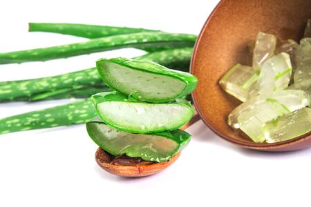 sliced and leaf of fresh aloe vera on white background , natural clear gel as the star beauty ingredient  for skin careの写真素材