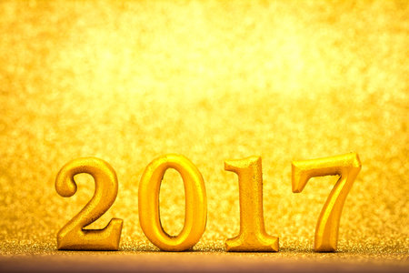 Number 2017 placed on gold elegant glamour background for new year 2017 celebration concept