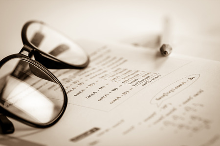 Close up Math Book and eyeglasses on subject of  Trigonometric function , mathematics study conceptの写真素材