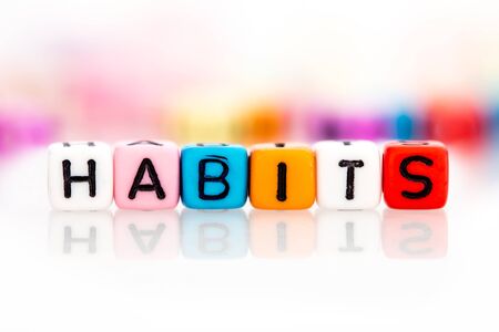 colorful word cube of habits on white backgroundの写真素材