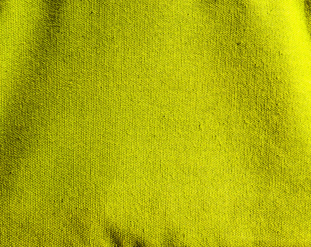 Close up yellow canvas fabric backgroundの写真素材