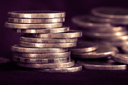 Close up silver money coin stacking on dark background