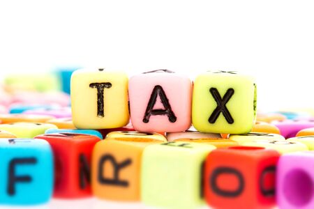 colorful alphabet  word cube of  TAXの写真素材
