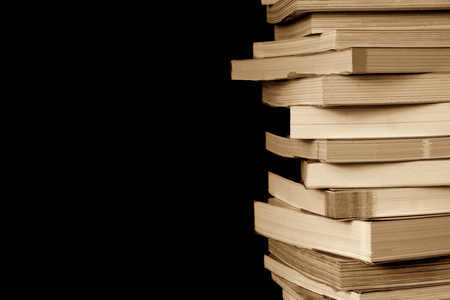 Close up book stacked  with the black backgroundの写真素材