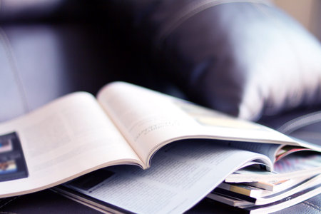selective focus of the stacking magazine place on table in living room