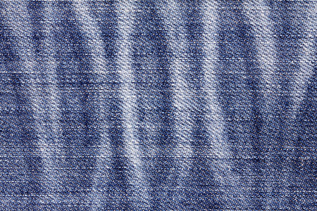 Close up  denim bright  blue jeans surface with rag patten texture background