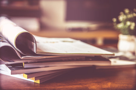 selective focus of the stacking magazine place on table in living room