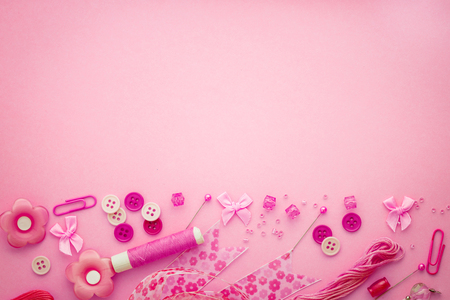 Sewing tool or craft tool on pink background , top view or overhead shot with copy spaceの写真素材