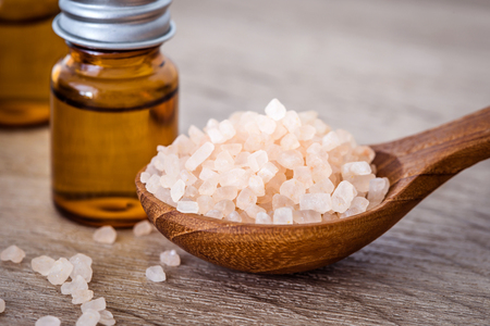 Close up brown organic Himalayan rock salt spa and cinnamon essential oil aroma set on the table , healthy spa relaxation conceptの写真素材