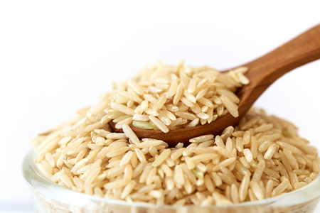 brown rice on white background , healthy foodの写真素材