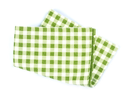 a green checkered napkin table clothes  on white background.の写真素材