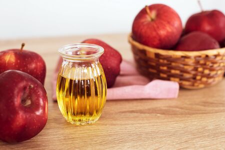 Close up red Apple fruit  and a apple cider vinegar juice, Helps Lose Weight and Reduces Belly Fat, healthy foodの写真素材