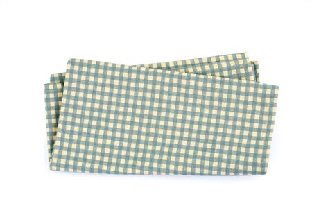 a green checkered napkin table clothes  on white background.の写真素材