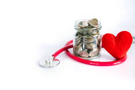 Health  insurance and Medical Healthcare heart disease concept, a red heart shape with stethoscope, financial healthcareの素材 [FY310130779713]