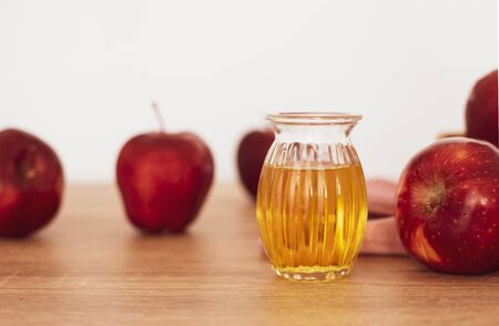 Close up red Apple fruit  and a apple cider vinegar juice, Helps Lose Weight and Reduces Belly Fat, healthy foodの写真素材