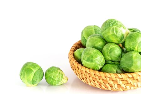 Fresh green brussel sprouts vegetable on white backgroundの写真素材
