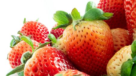 Close up  fresh of young red strawberry fruitの写真素材
