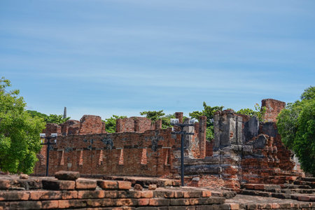 view to temple bricks wall remains of ruins old Siam capital Ayutthaya,the historical about...