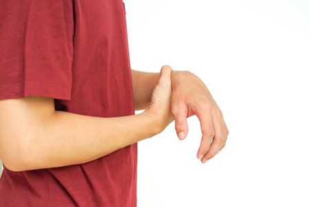 a man support his arms which pain,numbness,weakness,paralysis concept of Guillain barre syndrome...