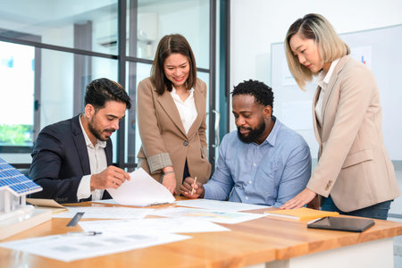 multiracial business people meeting to agree on cooperation,making decision on renewable energy...