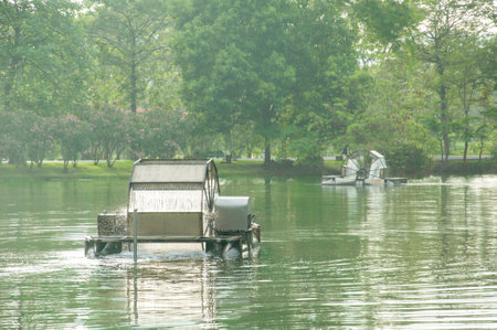 water treatment turbine to increase oxygen in wastewater in the pondの写真素材