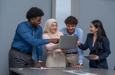 multiracial business colleagues discuss during a meeting in the conference room,businessman talking together with laptopの写真素材