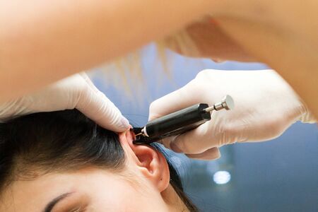 Puncture of the earの写真素材