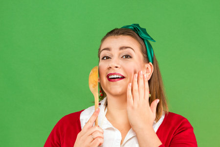 Woman with spoonの写真素材