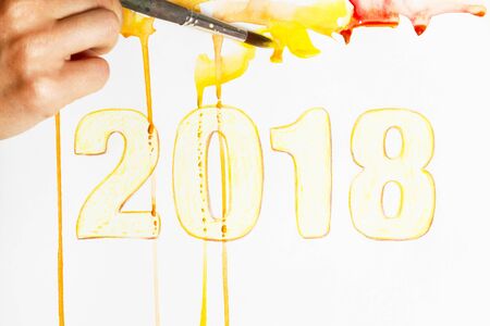 The man paints with watercolor paint.の写真素材