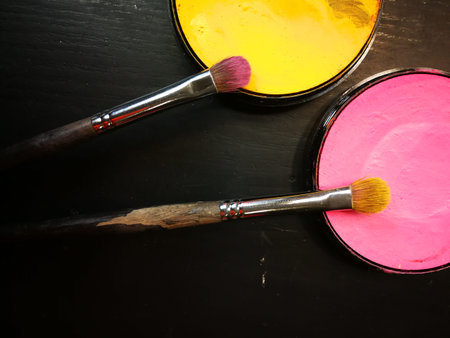 Artistic paints and brushes.
