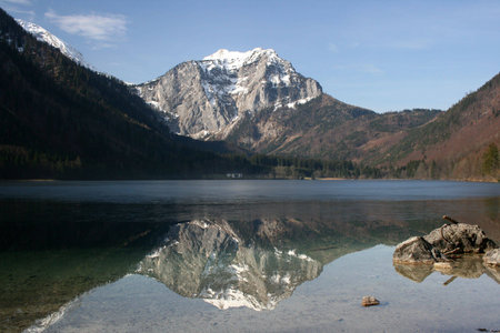 Reflection of the Mountain Brunnkogel in winter
