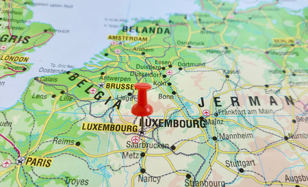 View of Luxembourg, officially the Grand Duchy of Luxembourg, is a landlocked country in Western Europe, on a geographical map of Europe, marked with red push pinの写真素材
