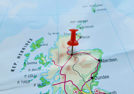 View of Inverness, City in the Highlands of Scotland, United Kingdom, on a geographical map of Europa, marked with red push pinの写真素材