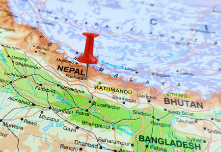 View of Pokhara, is a metropolitan city located in central Nepal, which serves as the capital of Gandaki Province, on a geographical map of Asia, marked with red push pinの写真素材