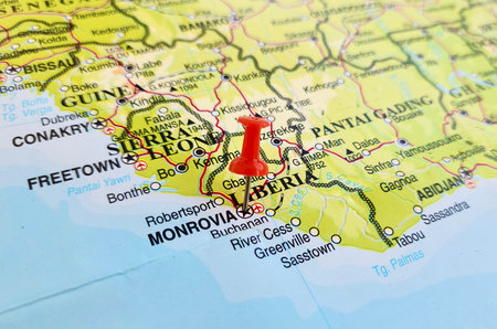 View of Monrovia, is the administrative capital and largest city of Liberia, on a geographical map of Africa, marked with red pushpinの写真素材