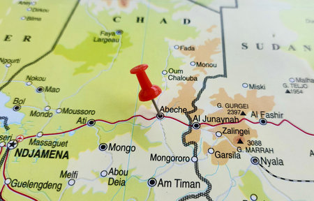 View of Abeche, is a city in central-eastern Chad and the capital of the Ouaddai Region, on a geographical map of Africa, marked with red pushpinの写真素材