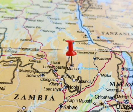 View of Mansa, is the capital of the Luapula Province of Zambia, and headquarters of Mansa District, on a geographical map of Africa, marked with red pushpinの写真素材